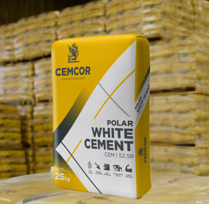 Packs of Cemcor white cement stacked in a warehouse setting